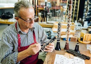 Man building clarinets at Herbert Neureiter in Austria